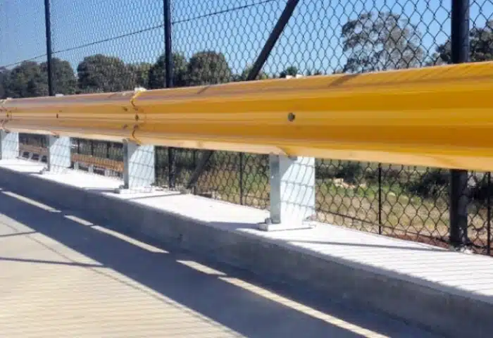 RHINO STOP TYPE 3 car park barrier installation near steel mesh fencing with black finish