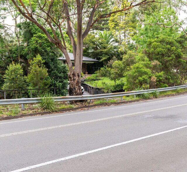 Gilbert Rd roadside crash barriers with departure terminal barrier, a commercial fencing service provided by metal fencing specialist